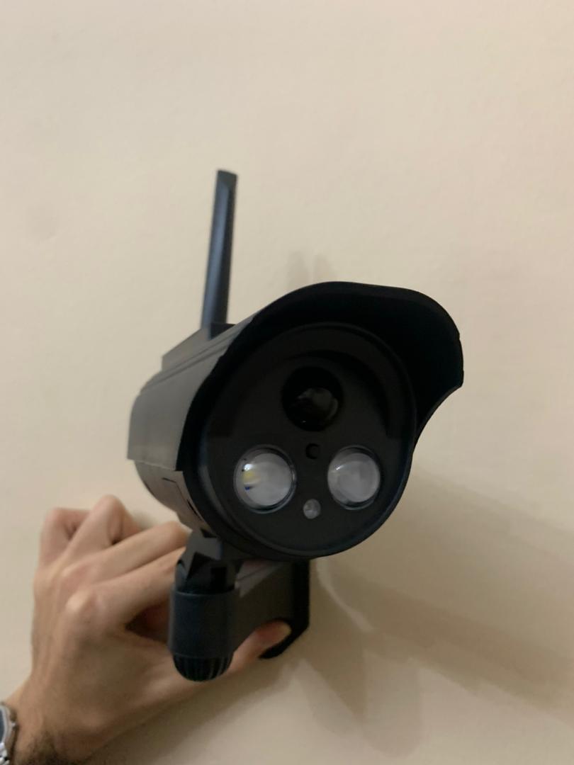 Dummy camera and solar lamp with motion sensor