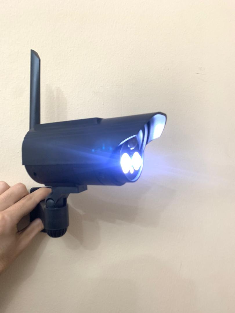 Dummy camera and solar lamp with motion sensor