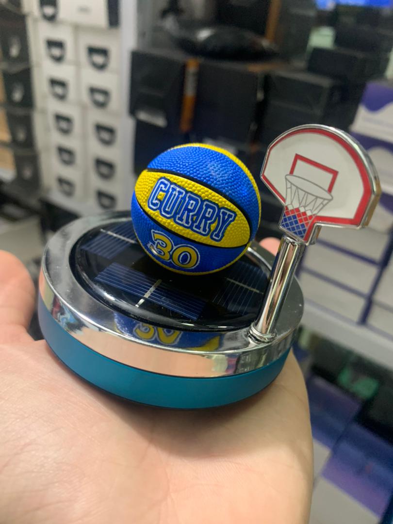 Solar powered basketball shaped car air purifier
