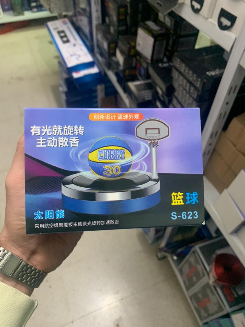 Solar powered basketball shaped car air purifier