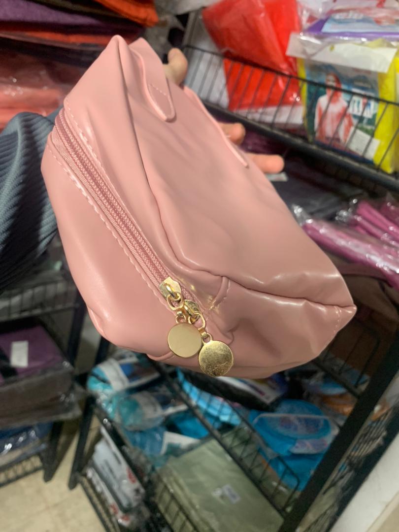 Faux leather cosmetic pouch with double zipper