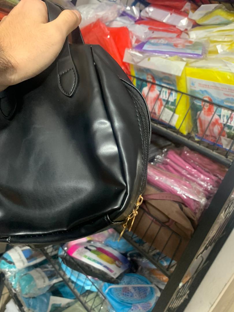 Faux leather cosmetic pouch with double zipper
