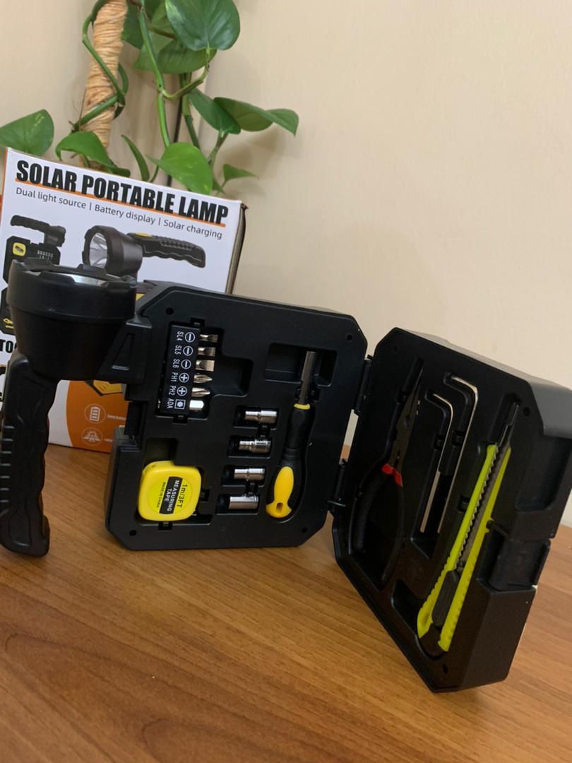 Portable solar lamp with screwdriver and tool kit
