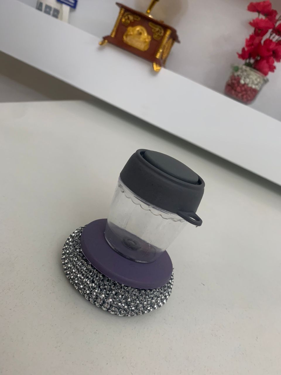 Handheld dish brush with soap dispenser