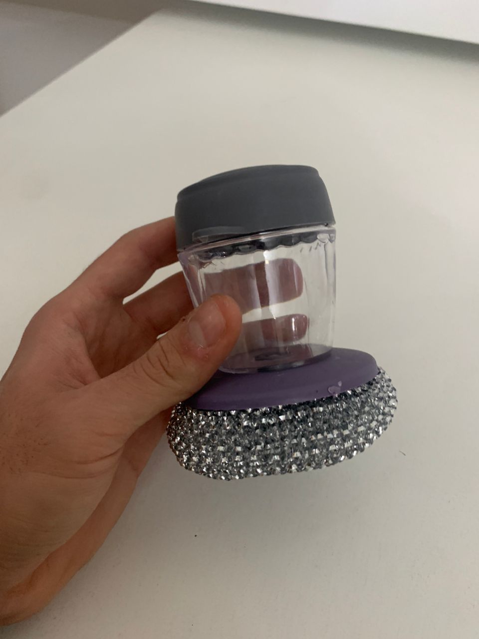 Handheld dish brush with soap dispenser