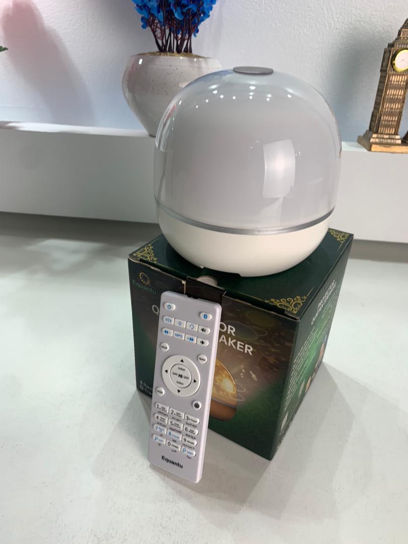 Rotating projection lamp with Quran speaker