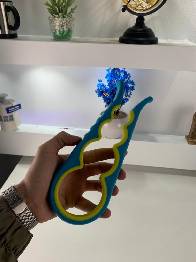 Ouvre-boîte Multifonction 4 en 1 et Cuillères à Mesurer Pliables en Silicone -  فتاحة العلب متعددة الوظائف و ملاعق قياس قابلة للطي