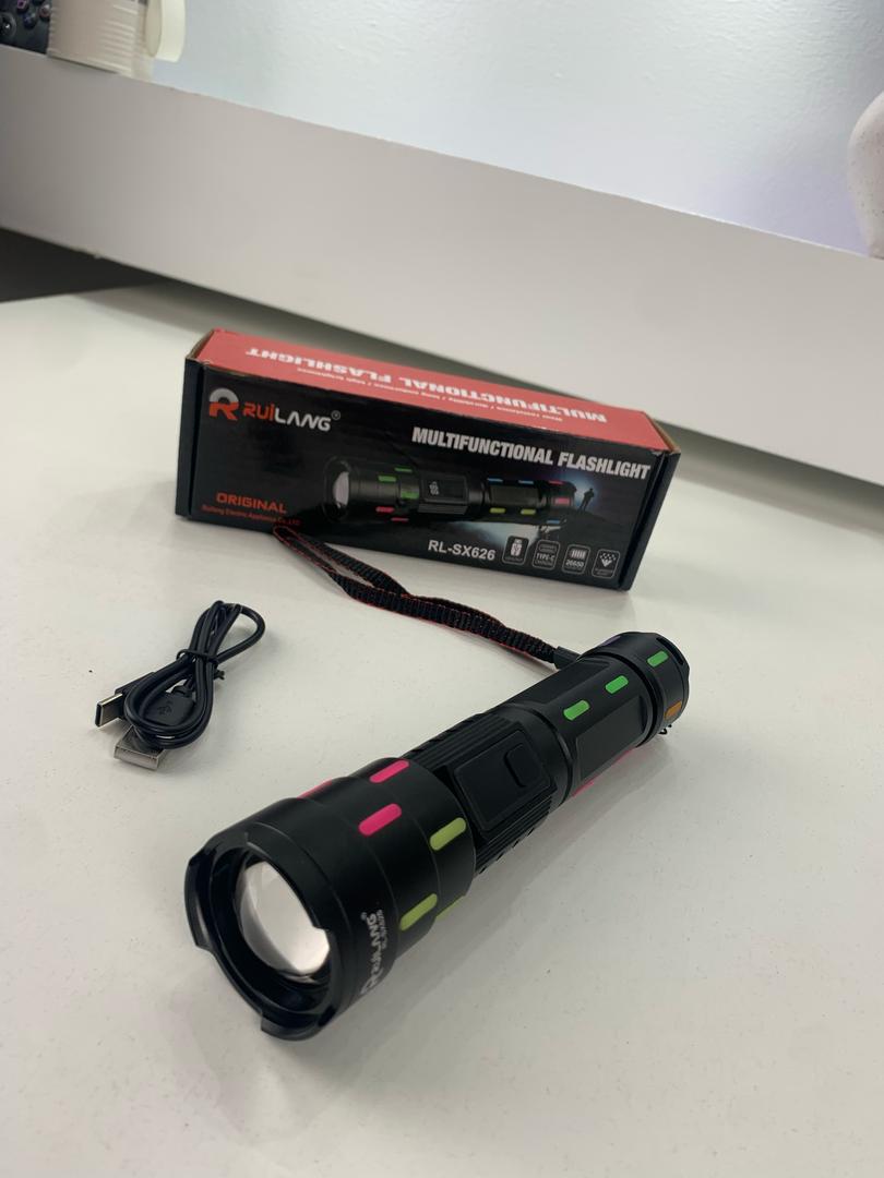 LED flashlight with telescopic zoom and fluorescent strips