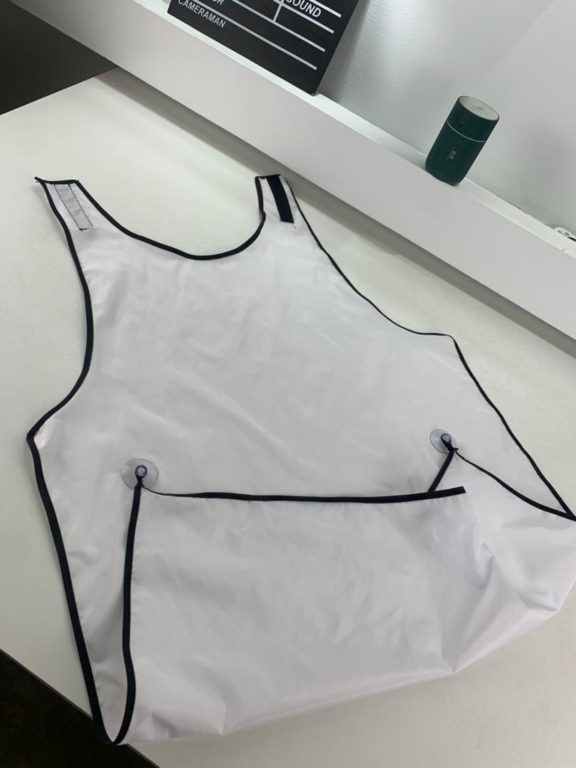 Waterproof men's beard shaving apron with mirror attachment