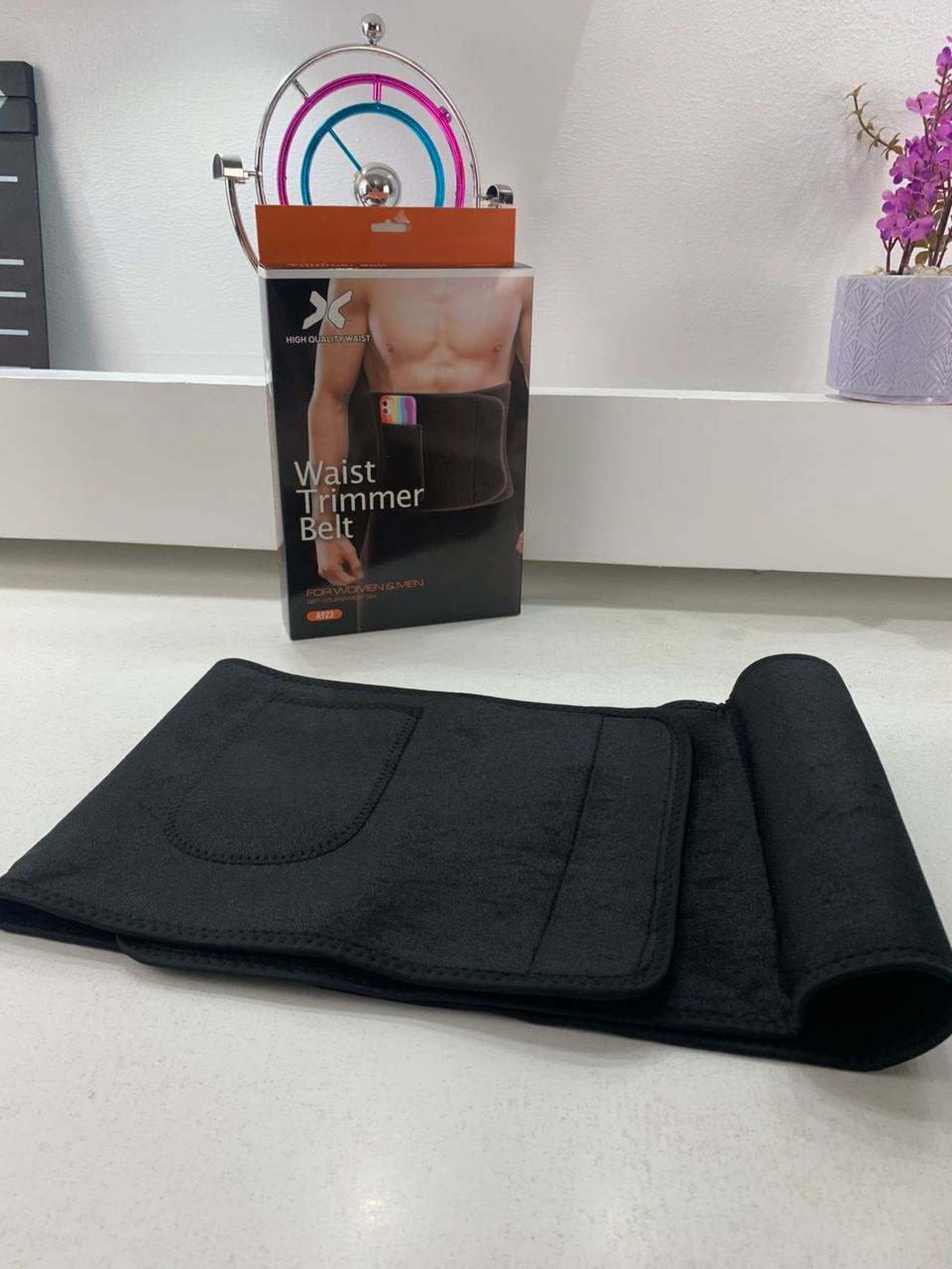 Unisex sweat belt with outer pocket