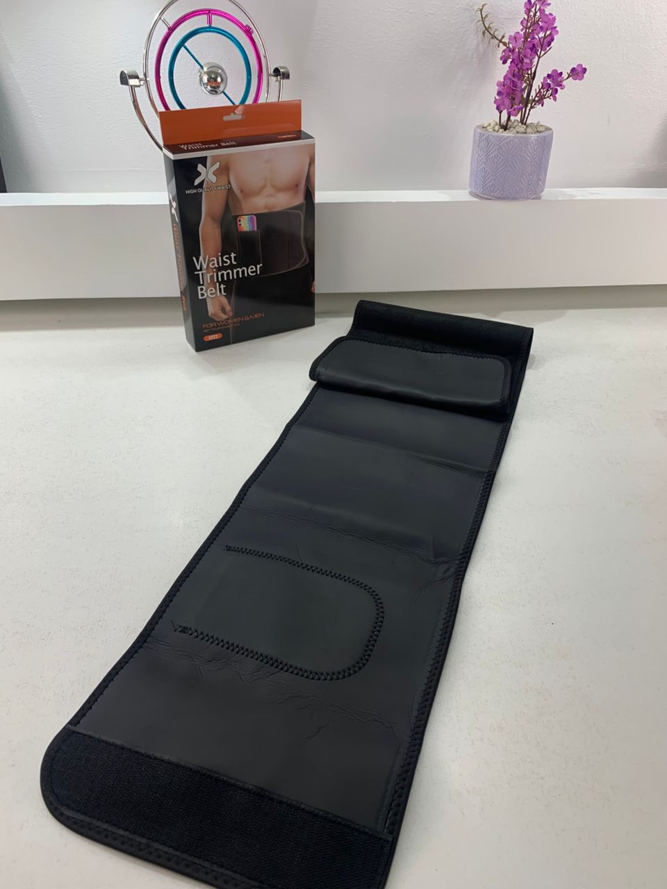 Unisex sweat belt with outer pocket