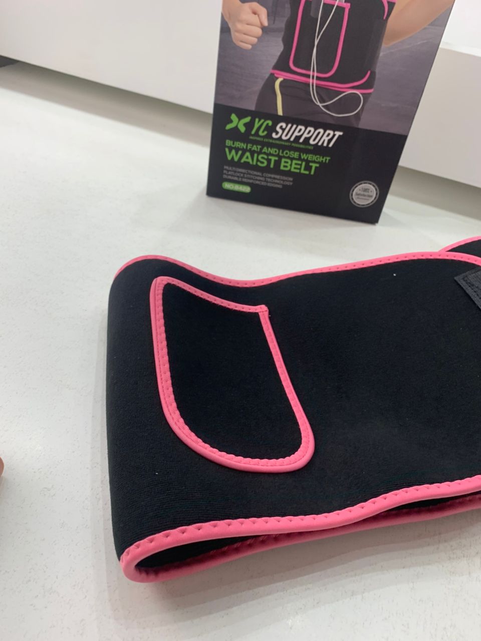 Women's slimming belt with phone pocket
