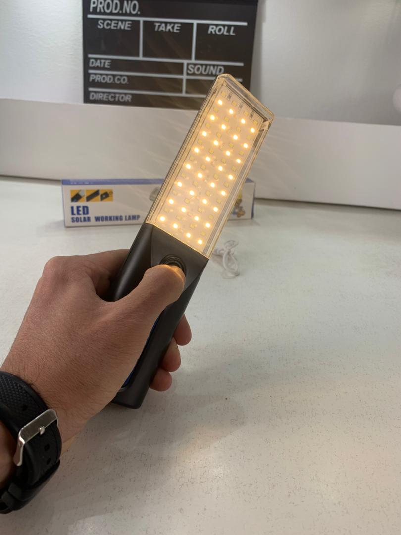 Rechargeable LED work light with solar panel