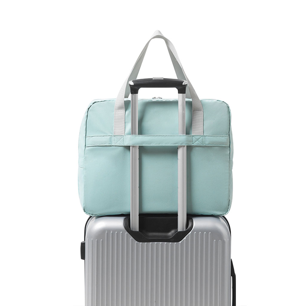 Foldable travel bag 23 L with luggage strap