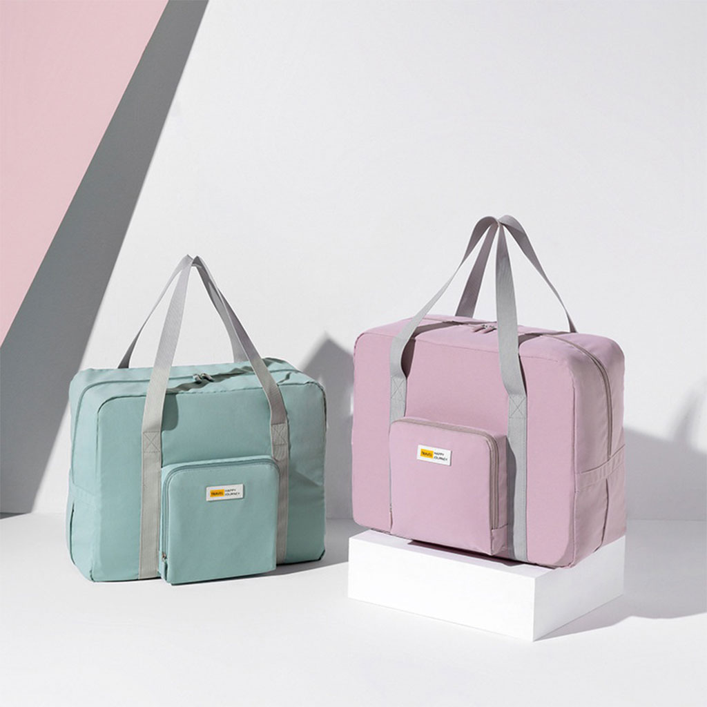 Foldable travel bag 23 L with luggage strap