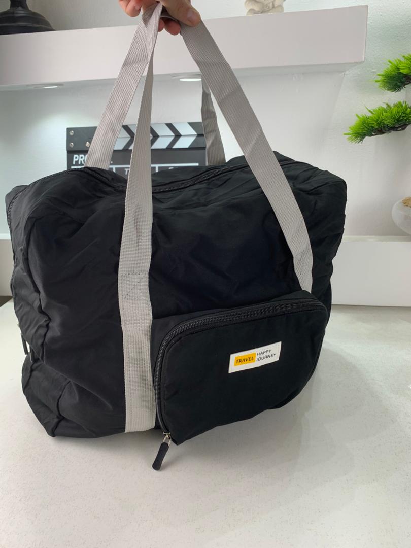 Foldable travel bag 23 L with luggage strap