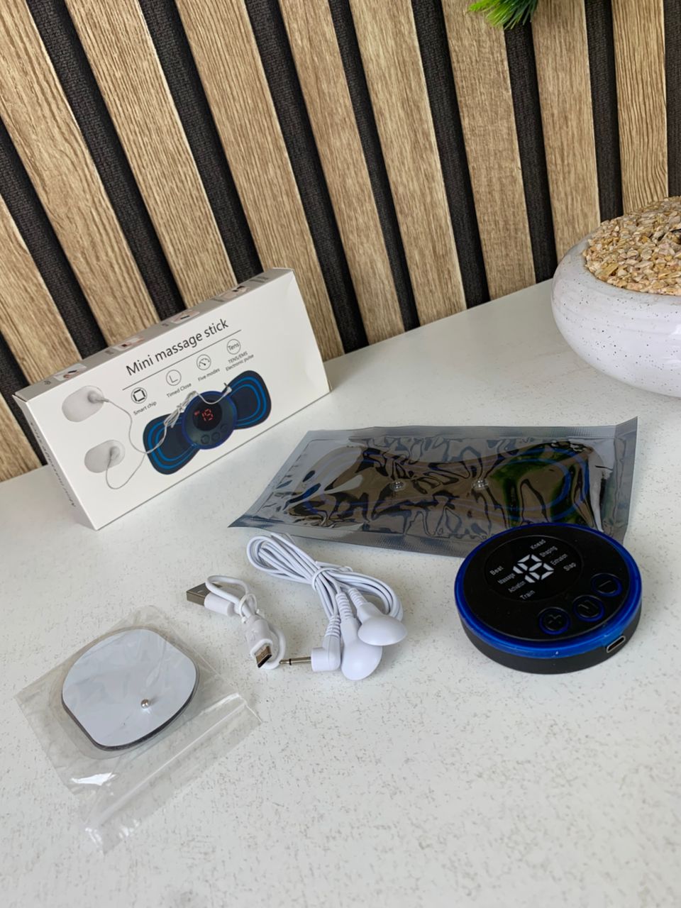 Mini electric neck massager with upgraded pulses